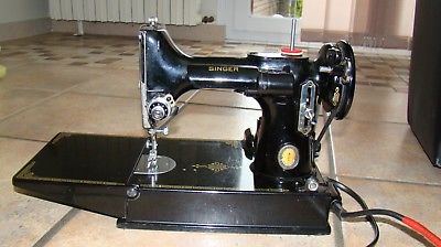 Machine a coudre portative singer