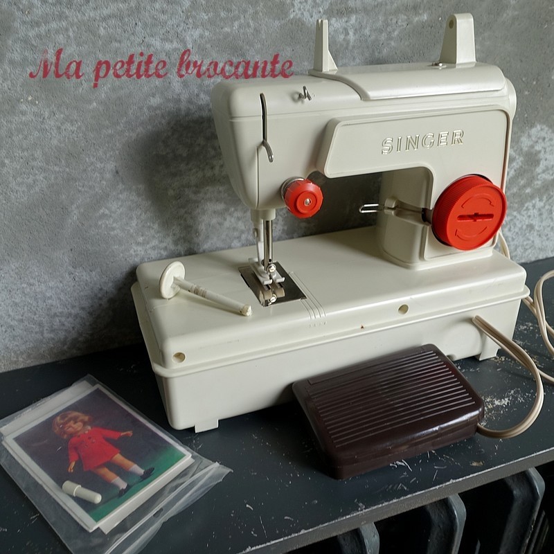 Machine à coudre marque singer