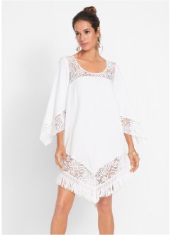 Robe de plage blanche porte