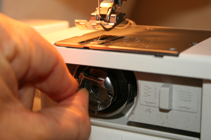 Comment faire une canette sur une machine à coudre singer