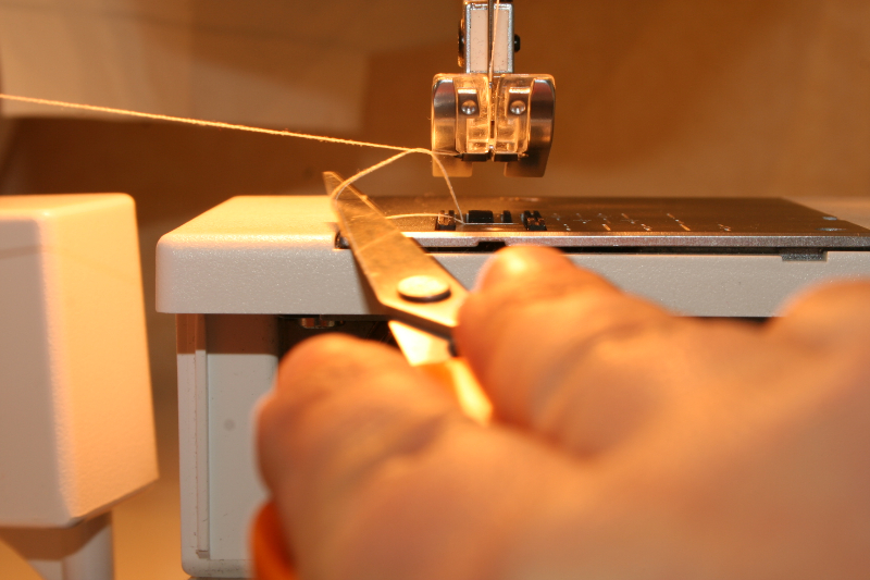 Principe canette machine à coudre