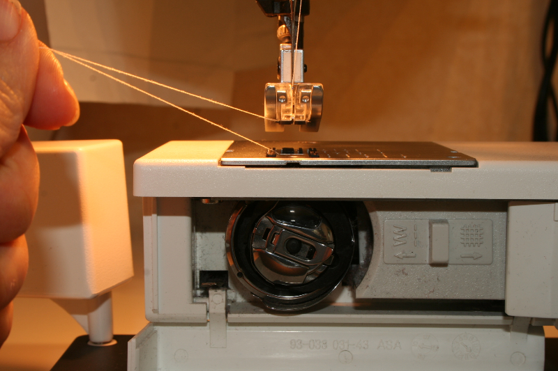 Sens canette machine à coudre