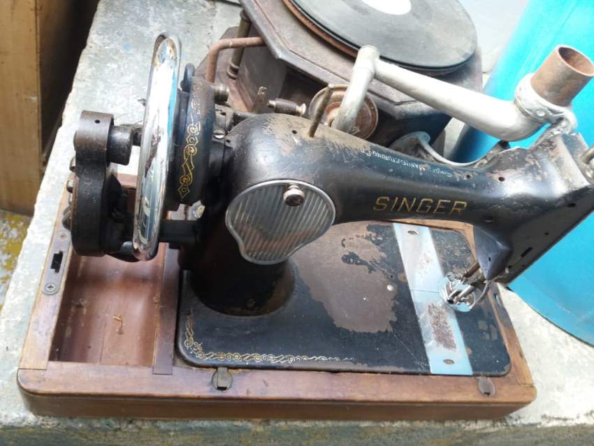 Installation machine a coudre singer