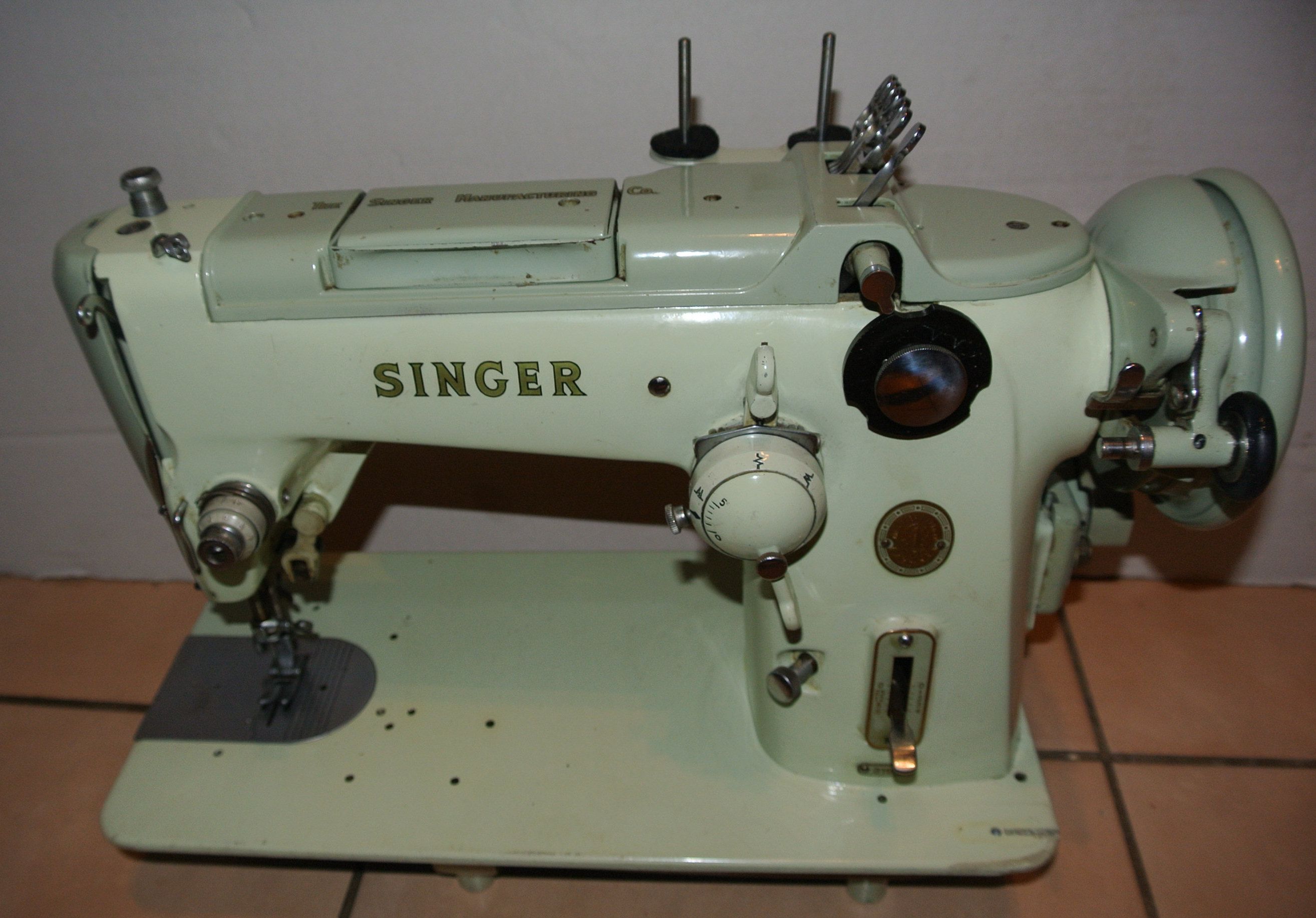 Machine a coudre singer 319k