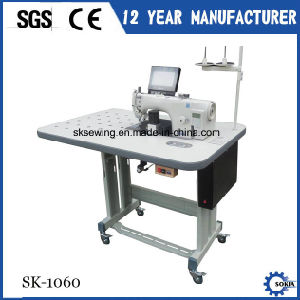 Cnc machine a coudre