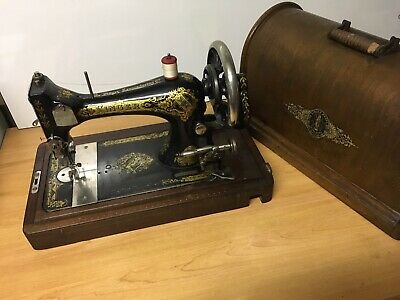 Dater machine à coudre singer
