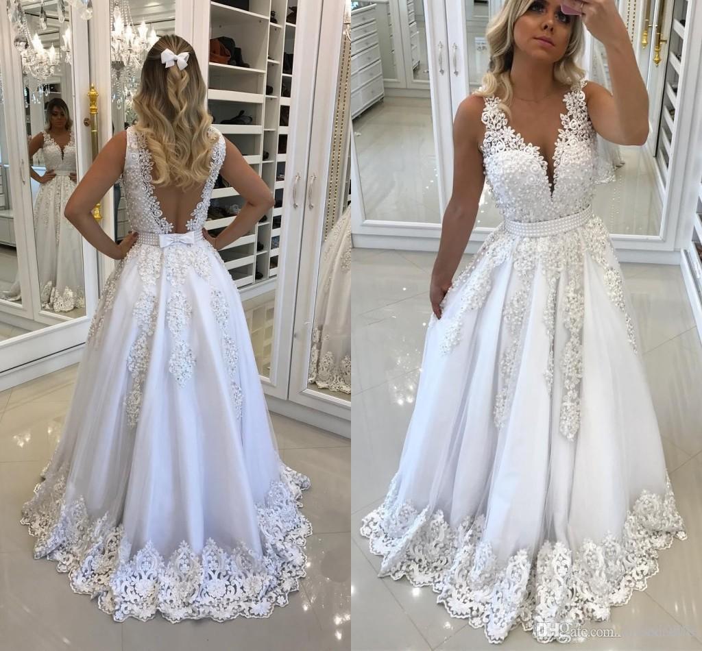 Robe dentelle dos nu blanche