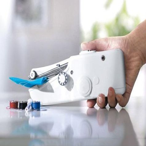 Handheld machine a coudre