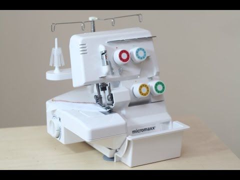 Machine à coudre surjeteuse quigg