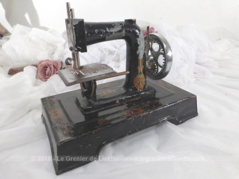 Machine à coudre ancienne rose