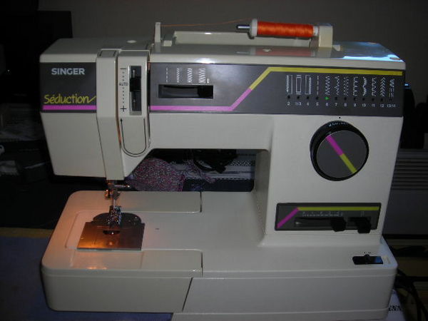 Notice machine a coudre singer harmonie 100
