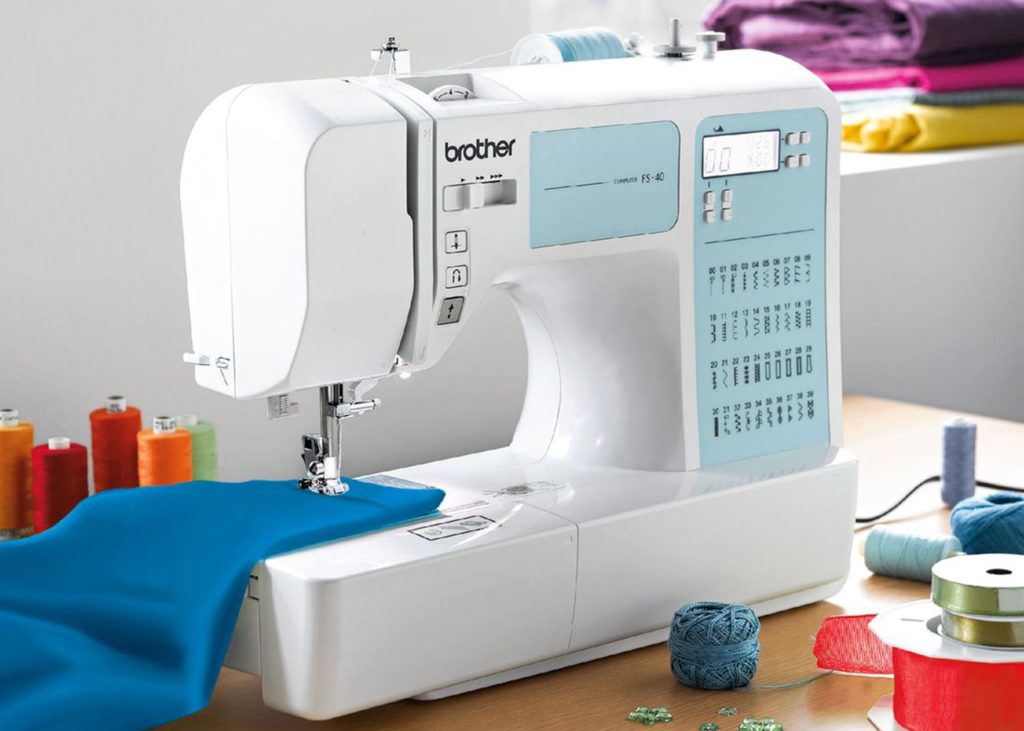 Demarrer couture machine a coudre