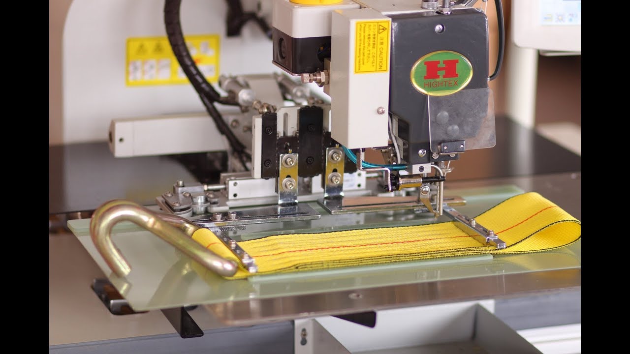 Machine à coudre pour sangle
