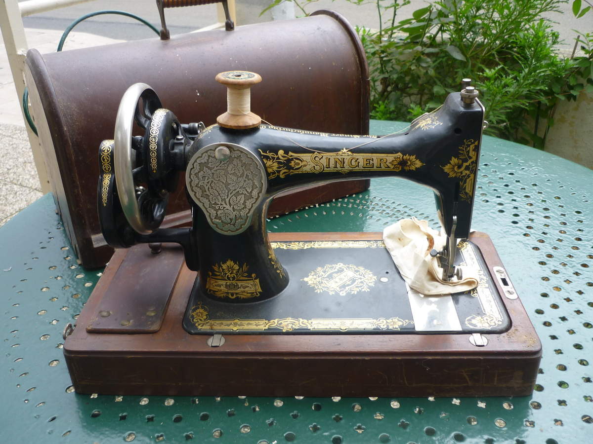 Machine à coudre singer portable