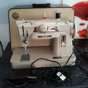 Machine a coudre reglage automatique
