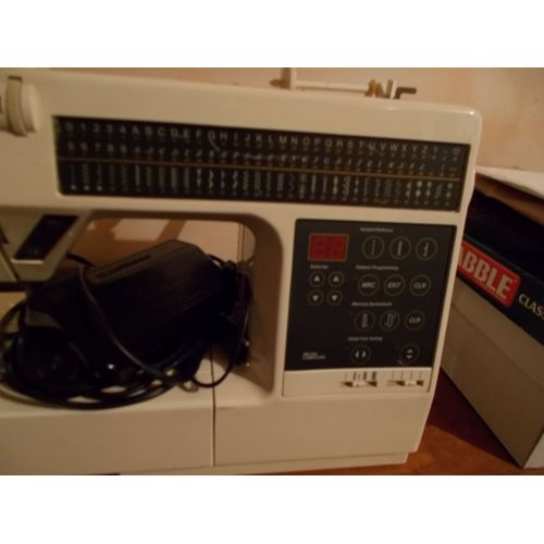 Machine a coudre singer rhapsodie 3000